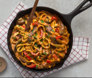 Rijst met Stroganoffsaus en gevogelte burger